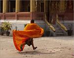 dennis-walton-buddhist-monk-running-100312.jpg