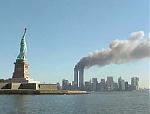 National_Park_Service_9-11_Statue_of_Liberty_and_WTC_fire.jpg